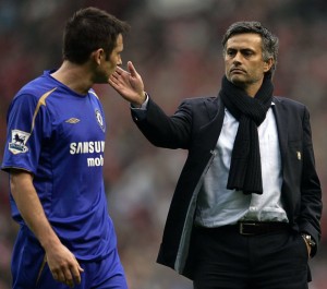 Chelsea's manager Mourinho consoles Lampard after loss to Liverpool during FA Cup semi-final soccer match at Old Trafford in Manchester